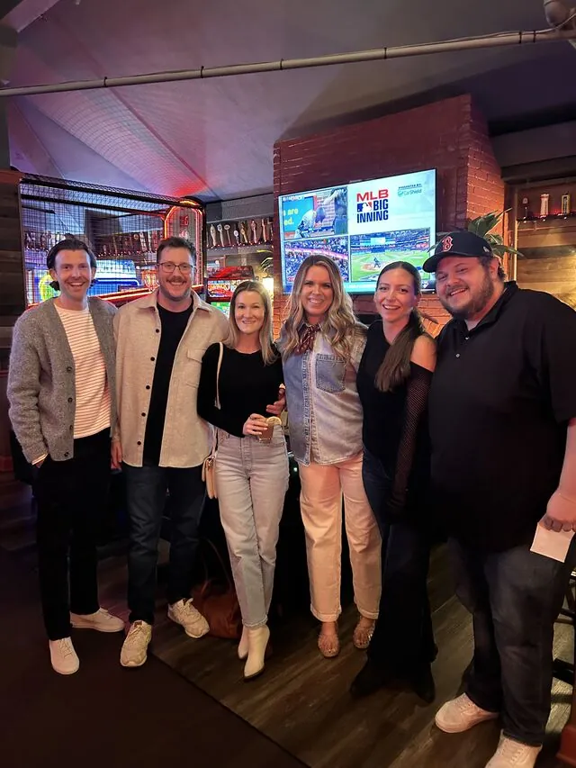 Six colleagues together in a Salem sports bar after the sessions