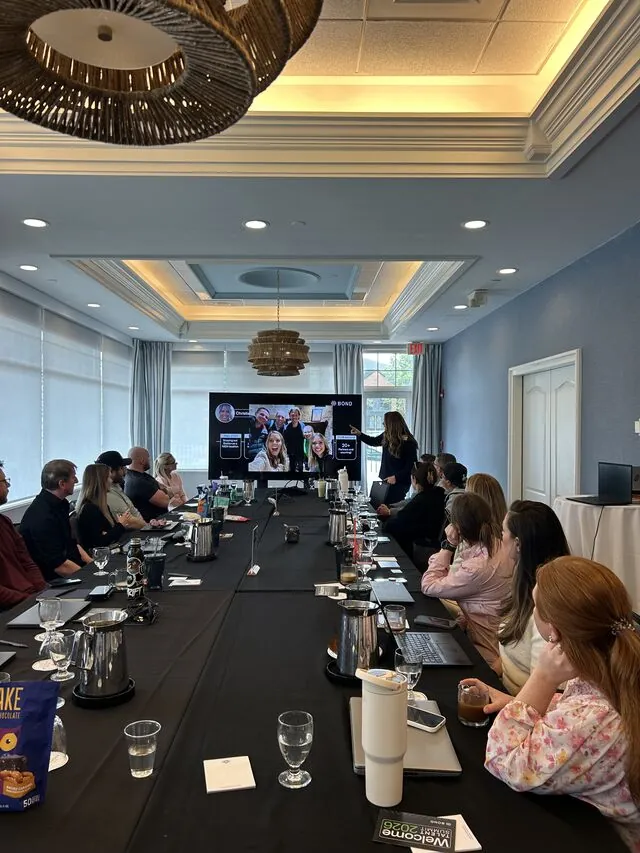 A summit session in progress, the US team round the boardroom table